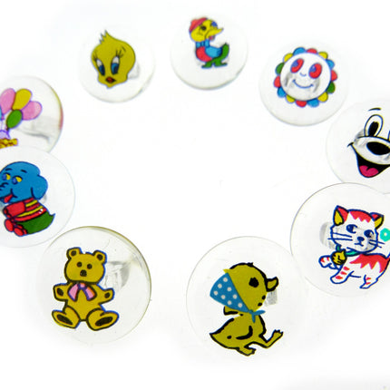 Children's clear crystal animal chank buttons on a white background