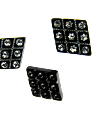 Three black diamante flower shank buttons arranged in a 2x2 grid pattern on a white background.