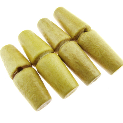 A set of beige wooden toggle buttons with a single drilled hole, displayed on a flat surface.