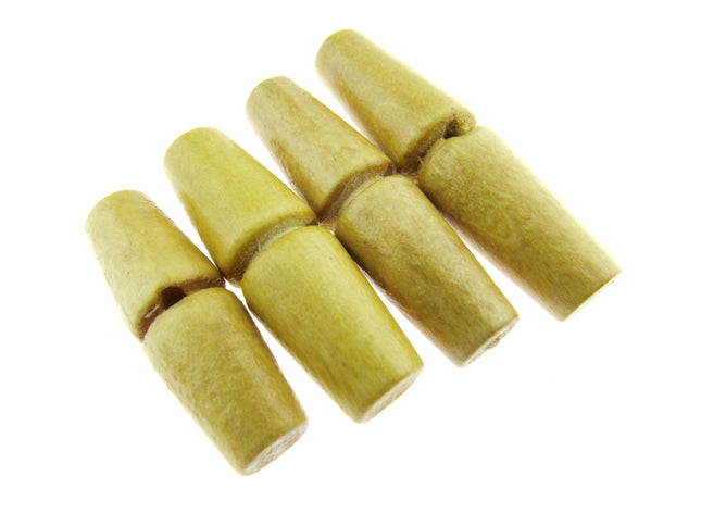 A set of beige wooden toggle buttons with a single drilled hole, displayed on a flat surface.