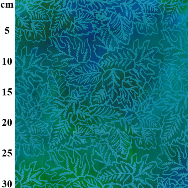 A woven and hand printed batik fabric featuring a green leaves pattern on a cotton base, available by meter or half meter.