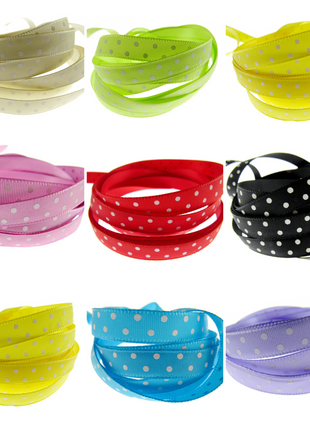 Assortment of 10mm satin ribbons with a polka dot pattern and woven edge in various colors including beige, yellow, pink, red, black, white, blue, and purple.