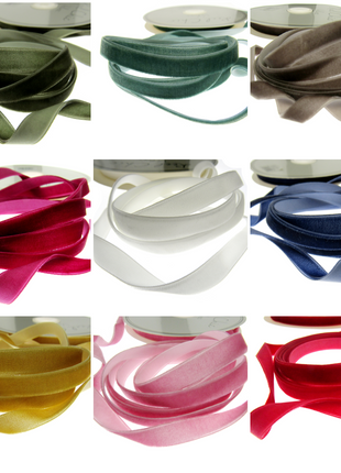 A collection of bright velvet ribbon on a white background