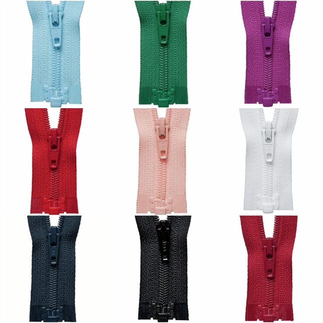 An assortment of YKK lightweight open end nylon zippers displayed in multiple colors.
